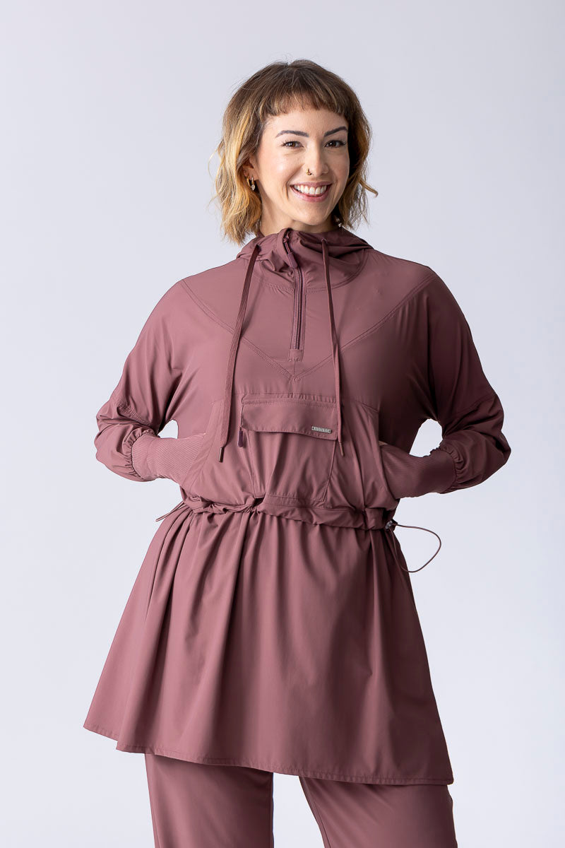 Light weight long line hoodie in dusty purple with adjustable waist, front pocket and large hood.