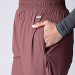 Lightweight joggers in dusty purple, with pockets and hight supportive waist.