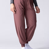 Lightweight joggers in dusty purple, with pockets and hight supportive waist.