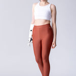 Swim leggings in terracotta.
