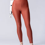 Swim leggings in terracotta.