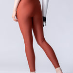 Swim leggings in terracotta.