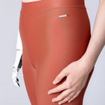 Swim leggings in terracotta.