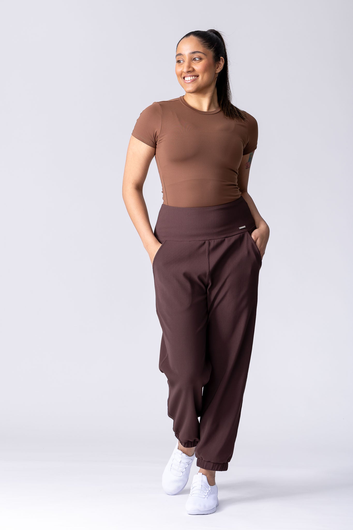 Coffee colour or brown colour relaxed ribbed joggers with high waist and deep pockets.