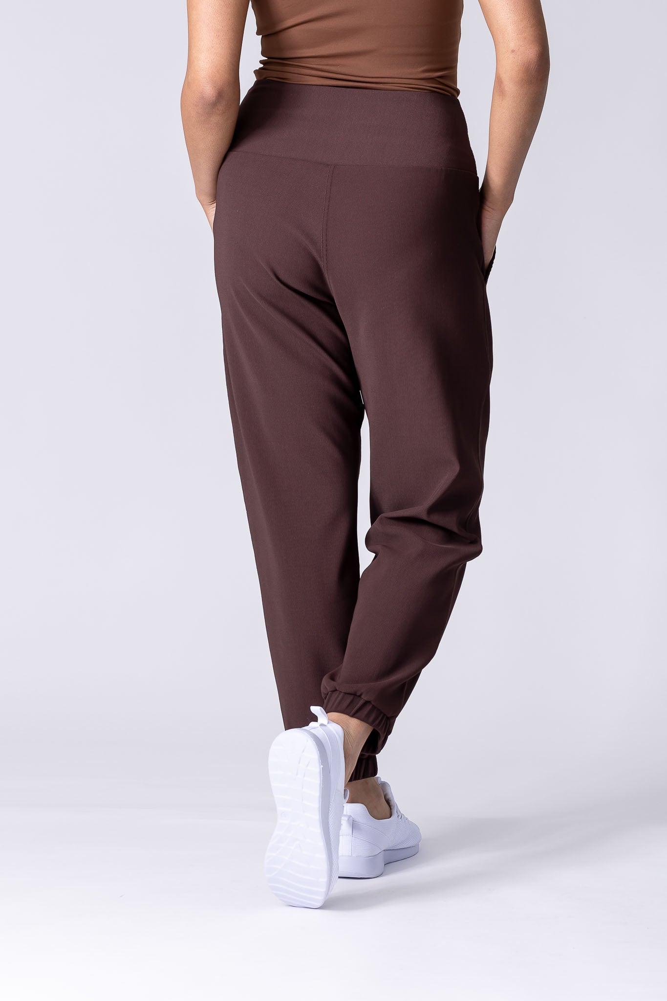 Coffee colour or brown colour relaxed ribbed joggers with high waist and deep pockets.