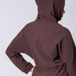 Coffee or brown colour longline hoodie with waist adjustability and draw string.