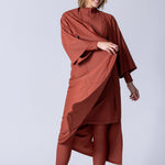 Beach Cover Up in terracotta colour maxi length with pocket, belt and made of swim fabric.