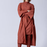 Beach Cover Up in terracotta colour maxi length with pocket, belt and made of swim fabric.