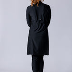Modest midi swim tunic in black with front zipper, waist belt and UV proof swim fabric.