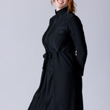 Modest midi swim tunic in black with front zipper, waist belt and UV proof swim fabric.