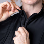 Modest midi swim tunic in black with front zipper, waist belt and UV proof swim fabric.