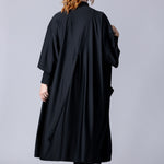 Beach Cover Up in black maxi length with pocket, belt and made of swim fabric.