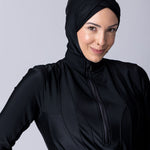 Instant swim hijab in black from crisscross design for comfort and good fit. Has back clips to adjust sizing for lots of hair.