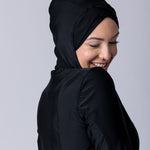Instant swim hijab in black from crisscross design for comfort and good fit. Has back clips to adjust sizing for lots of hair.