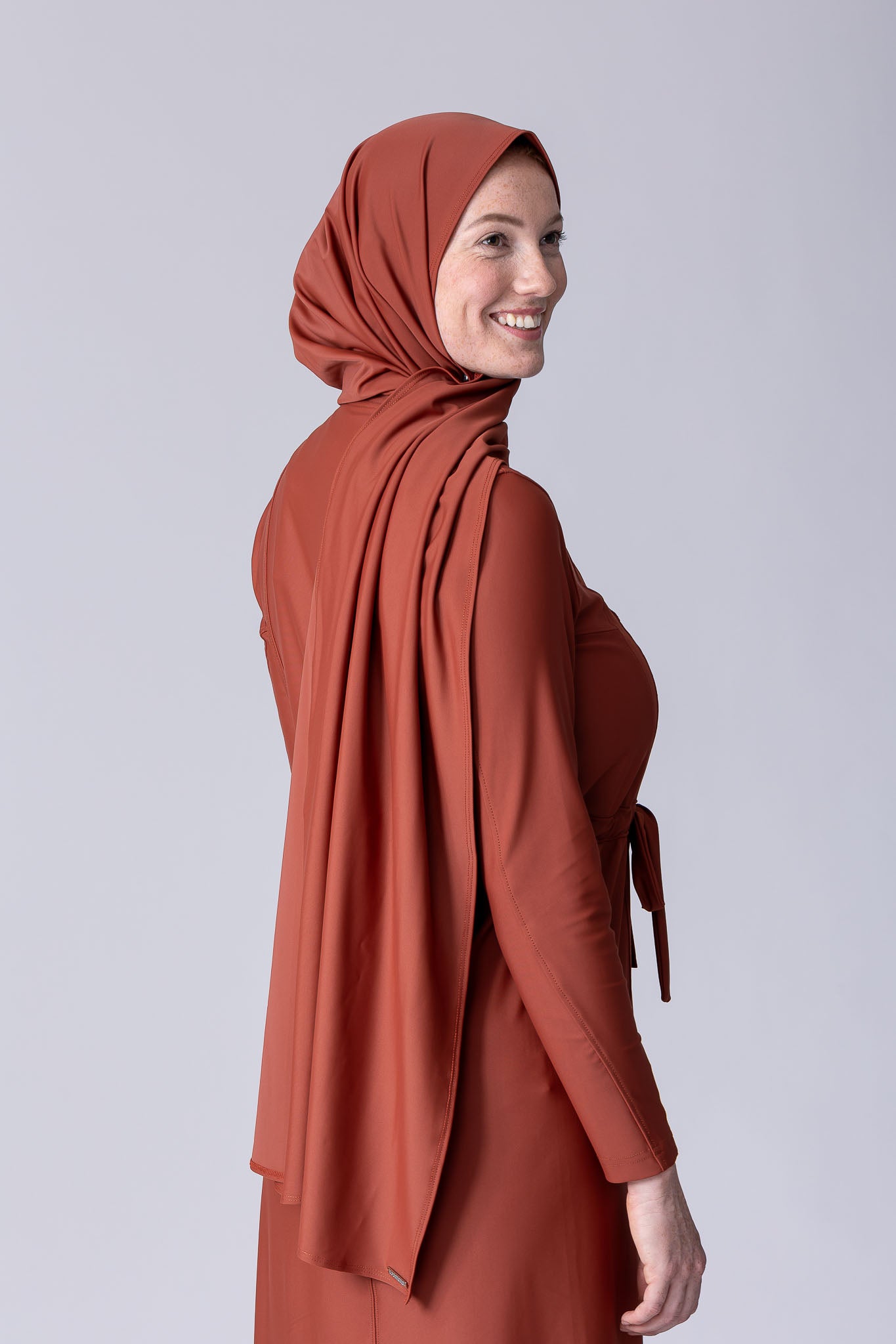Swim hijab shawl in terracotta with swim fabric..