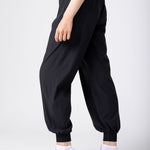 Lightweight joggers in black, with pockets and hight supportive waist.