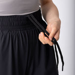 Lightweight joggers in black, with pockets and hight supportive waist.