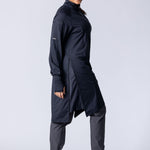 Long line tunic top in black. With front zipper, hidden side panels, back breathability panel and waist belt with buckle.