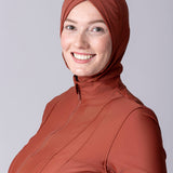 Instant swim hijab in terracotta colour from crisscross design for comfort and good fit. Has back clips to adjust sizing for lots of hair.