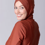 Instant swim hijab in terracotta colour from crisscross design for comfort and good fit. Has back clips to adjust sizing for lots of hair.